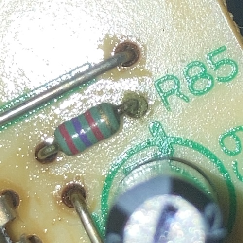 The resistor R85 appears to have some gunk on the right side of it.