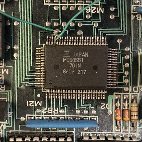 The MB88551 that will destroy my entire life later. Sorry, that's a spoiler. Again, these bodge wires are a continuity error and not something Fujitsu left on the board.