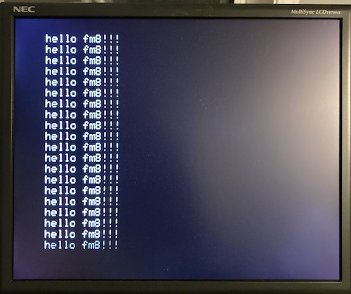 The computer has booted, and I am running the classic BASIC hello world program in a constant loop. It says "hello fm8!!!" over and over.