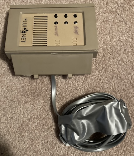 The FujiNet. It is a Coleco ADAM drive bay with a phone cord sticking out of it.