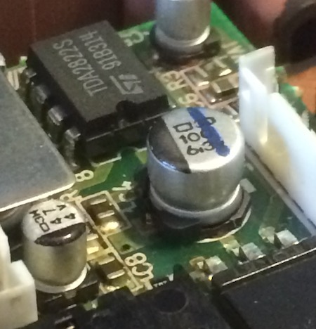 The sound board's SMD caps. There is not really any obvious show of leakage.