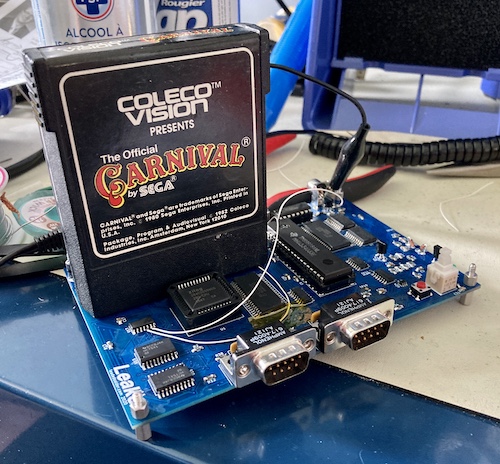 The Leako board under bring-up, with a cartridge for Sega's "Carnival" in it.