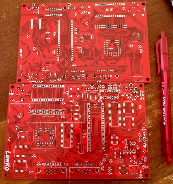 The (red) v0.1 boards, front and back.