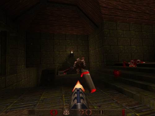 A screenshot from the Quake demo. You can tell that it is running on an enhanced source port and not the original Quake code. This is because the gib particles are pleasantly sized and round, the grenade is smooth, and the muzzle flash from the grenade is a smooth gradient. An Ogre is about to get taken out.
