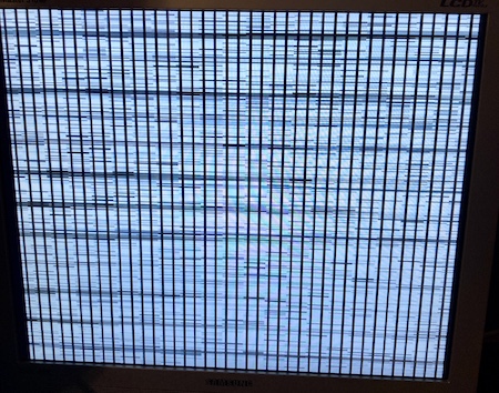 The screen garbage resulting from the dirty VRAM contacts.