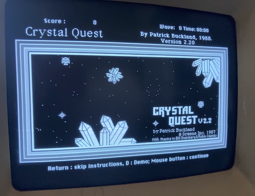 The title screen for "Crystal Quest" on the Macintosh SE's CRT. This later bombed out with an unimplemented trap error.