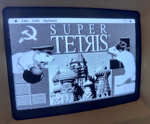 The title screen for "Super Tetris" on the Macintosh SE's CRT.