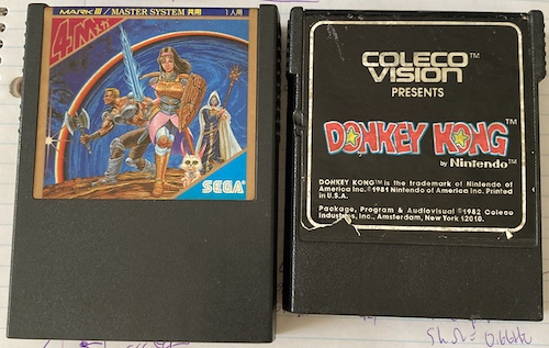 The Mark III Phantasy Star next to a copy of Donkey Kong for the ColecoVision.