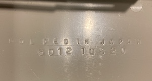 The top case of the machine says MOLDED IN JAPAN.