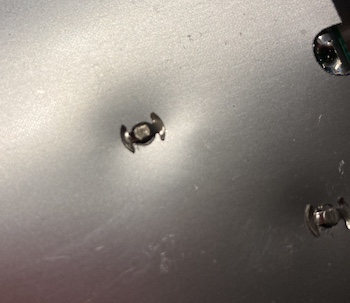 Little annoying clips are visible on the silver surface of the RF shield. This is a boring photo.