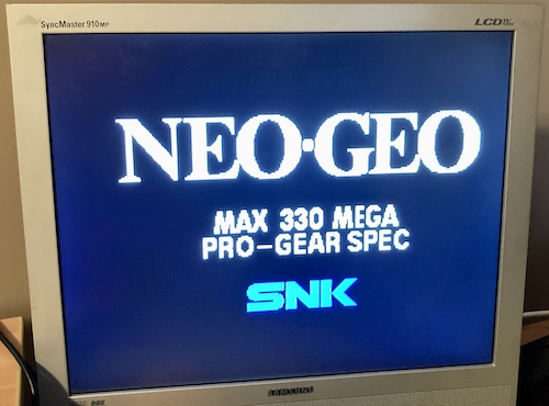 The Neo-Geo board is starting up on the TV.