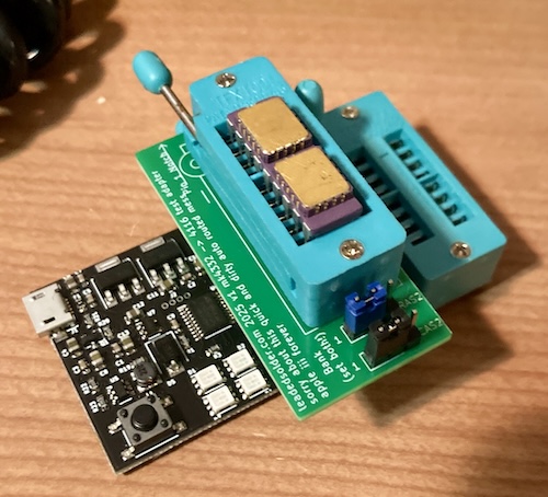 The 4332 to 4116 adapter. It's a PCB with a ZIF socket sitting on top of the 4116 RAM tester PCB, also stuck into a ZIF socket. A golden 4332 module sits on top. I'm hungry, who wants sandwiches?