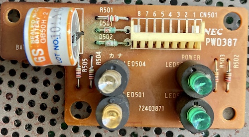 The front panel is badly damaged by green battery corrosion. Two diodes are corroded.