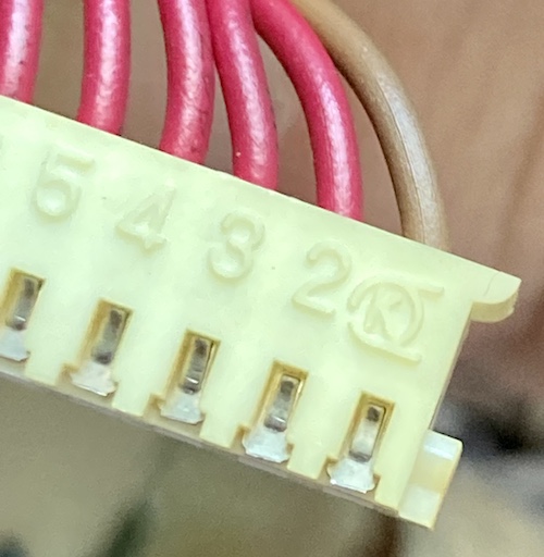 The female side of the connector for this PCB. It has an odd symbol containing a "K" where the pin 1 callout should go.