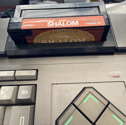 Shalom (Konami, 1987) is inserted into the slot.