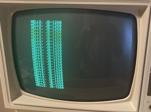 The traditional "Hello, JB-1260" repeating BASIC text is shown from the IIe.