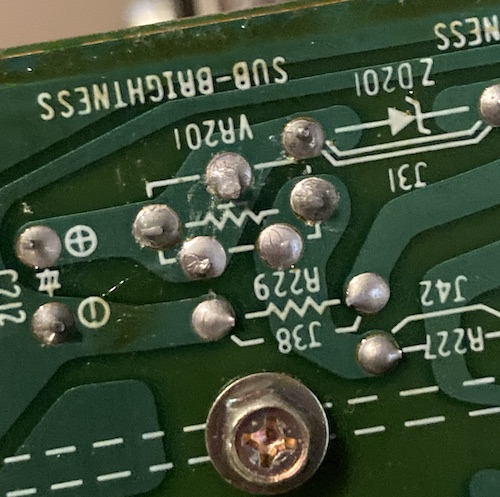 The underside of the sub-brightness pot. I measured resistance between the centre pin and the rightmost pin.