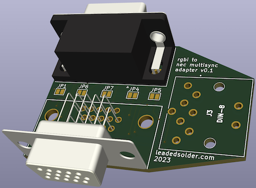 The prototype adapter, with an empty DIN8 on the right side, and a DE9 and a HD15 connector loaded into it.