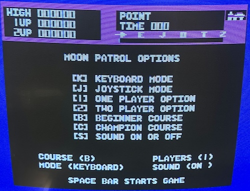 The main menu for Moon Patrol, showing that the game is configured for Beginner level using the keyboard.