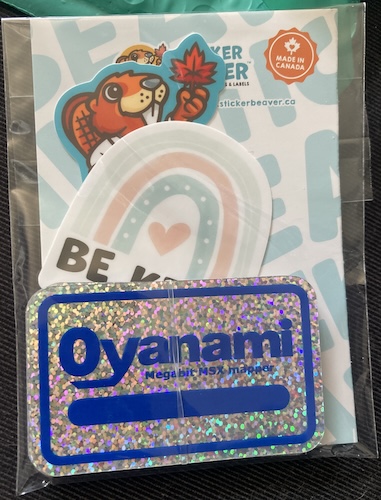 The sparkly Oyanami stickers arrived in a package with a Sticker Beaver promo brochure and some samples.