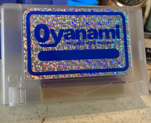 The gold version-2 cartridge stuck into a case.