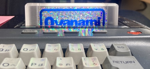 The finished cartridge is inserted into the HB-101, and a sparkly reflection can be seen on the gloss black of the case.