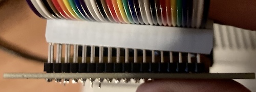 The ribbon cable connector doesn't fit, because the leftmost pins (35, 36) are interfering with the extra width on the plastic IDC cable head.