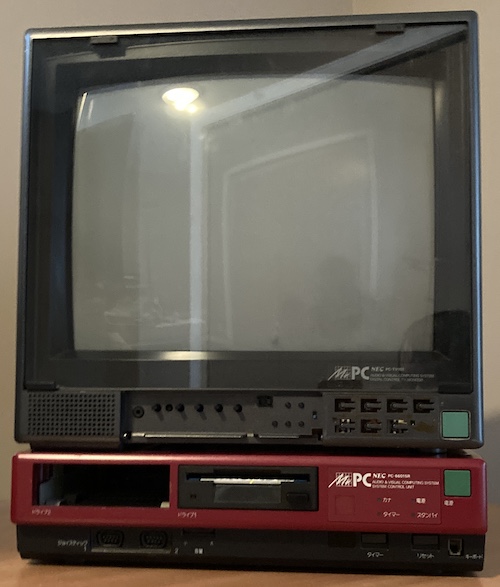 The black PC-TV151 sitting atop the red PC-6601SR.