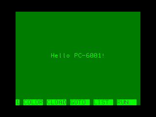 A screen from the MAME PC-6001 emulator, showing "Hello PC-6001!" roughly in the middle of the screen. A function key bar is shown at the bottom of the screen.