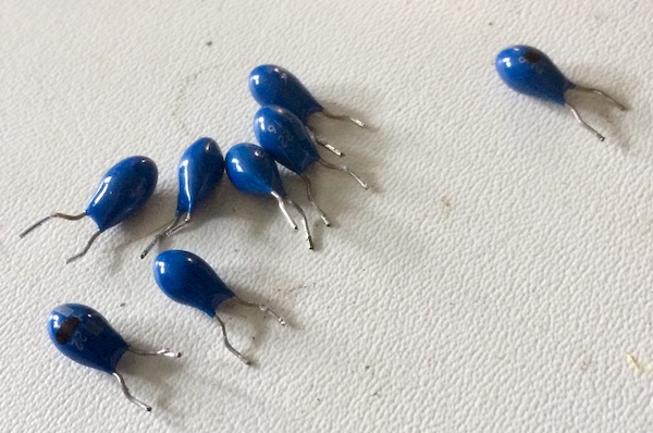 Eight blue tantalum caps on my anti-static mat