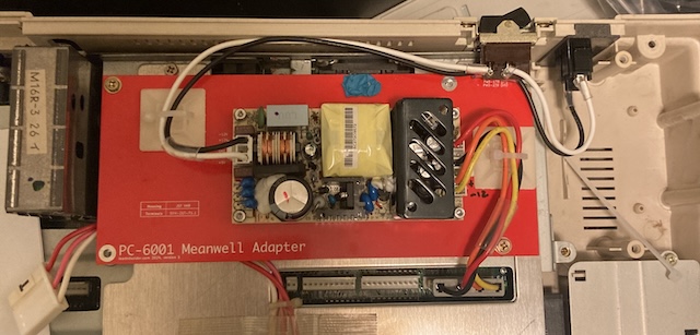 The power supply's mains side is fully wired from inlet to switch to power supply. Also, I left some poster putty on the board because I wasn't paying attention.