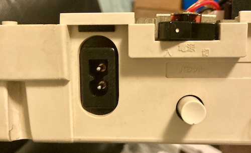 The inlet connector is sticking out through the back of the PC-6001.
