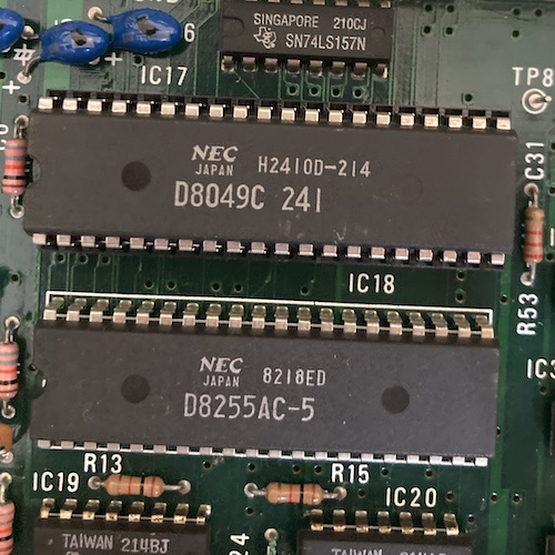 The 8049 is camping out at IC17, just above the D8255AC PIO controller. Its mask number is D8049C-241, H2410D-214, made by NEC Japan.