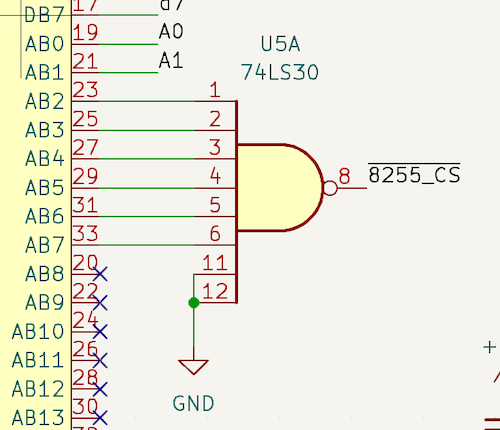 The 74LS30 is wired up to pins A2..A7 of the 8001's expansion interface. Two unused inputs are grounded.