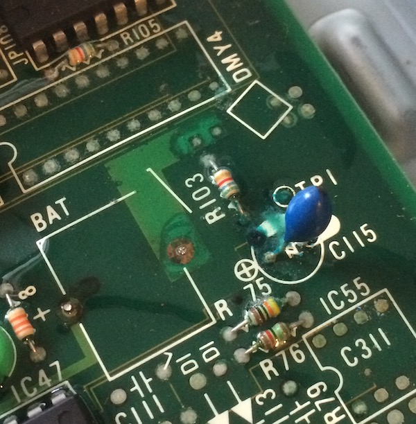 An old picture from when I had removed the battery but not begun the process of repair. Note that R75 still has its colour bands, reading (right to left) yellow orange black black brown