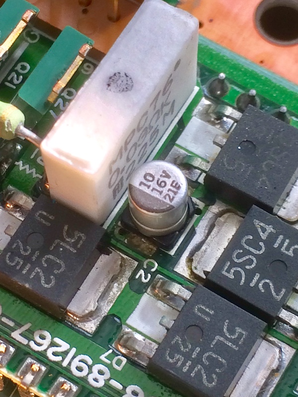 The power board electrolytic can cap, whose pads are badly corroded