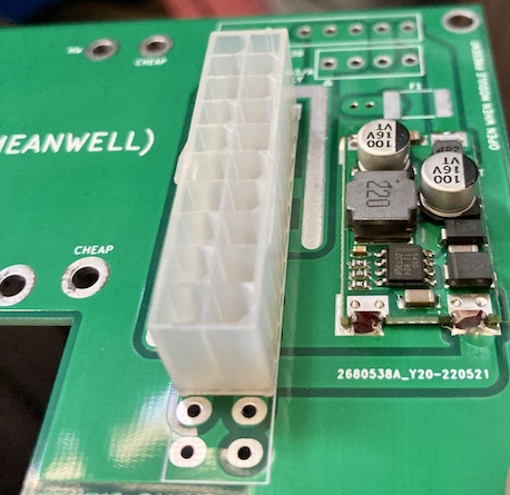 The little Taobao board (right) is soldered down to the power supply adapter board.