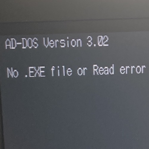 The Tokio "System Disk" has booted, but is failing to load, claiming "no .EXE file or read error."