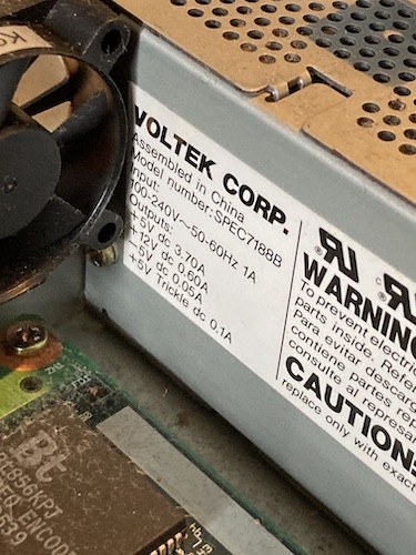 The Voltek power supply. The label says model SPEC7188B, +5V 3.70A, +12V 0.60A, -5V 0.05A, +5V trickle (standby) 0.1A