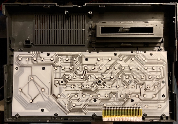 The underside of the keyboard membrane. It looks fairly clean.
