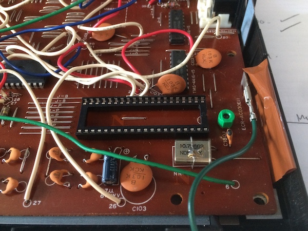 The TMS9118 socket is installed on the topside of the board.