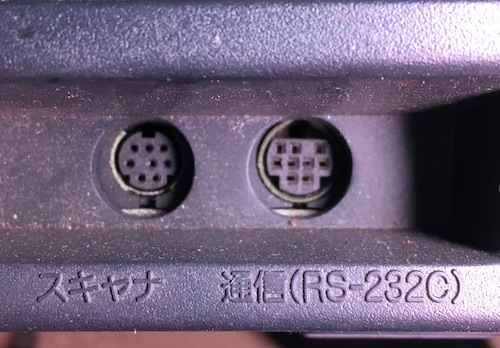 The RS-232C mini-DIN port (right) and the "scanner" port (left.)