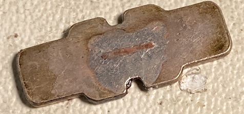 The leaf, after just being cleaned with alcohol. You can see the spot where the rubber follower of the switch has rubbed through multiple layers of plating. This switch has been used a LOT.