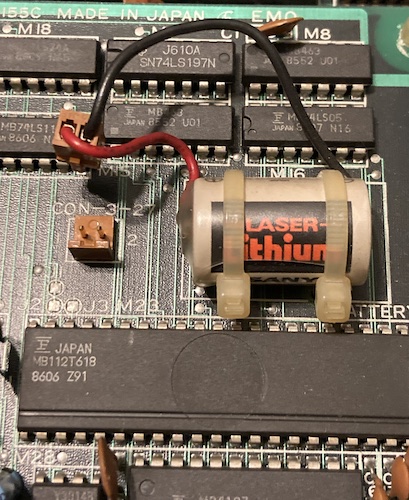 The battery, before removal. It's a Sanyo LASER LITHIUM.