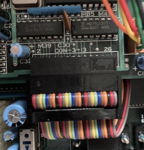 CON 3-13, with a multi-colored ribbon cable installed.