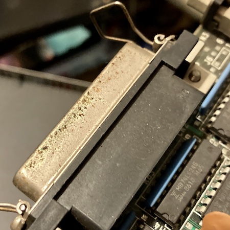 Some green crap on the shield of the I/O port