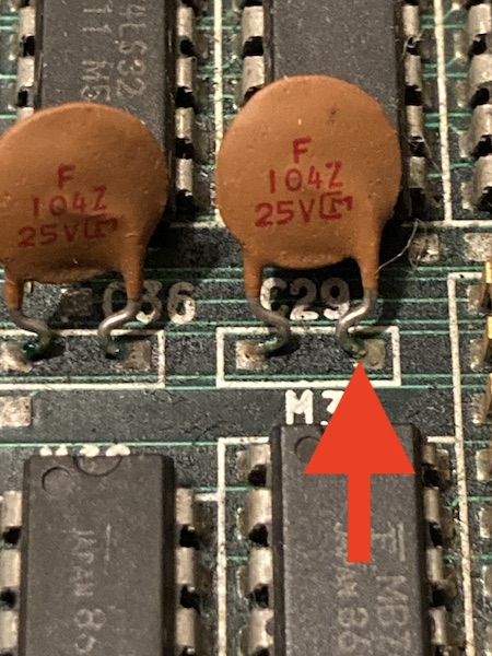 The green leaky crap on the legs of some of the 0.1µF bypass caps