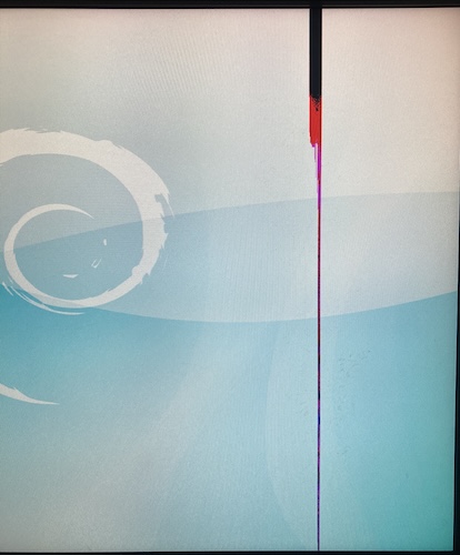 A dark mark turns into a red smear that eventually covers the entire height of the screen. The default Debian wallpaper is in the background.