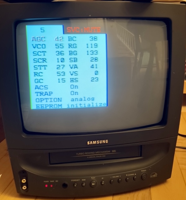 The service menu for the set. At the top it says "5," and SVC: MUTE. The current settings are AGC: 42, BC: 38, VCO: 55, RG: 119, SCT: 36, BG: 133, SCR: 10, SB: 28, STT: 27, VA: 41, RC: 53, VS: 0, GC: 15, HS: 23, ACS: On, TRAP: On, OPTION: analog, EEPROM initialize