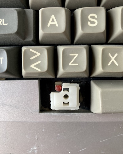 This toggle-able keycap in the lower left is missing.